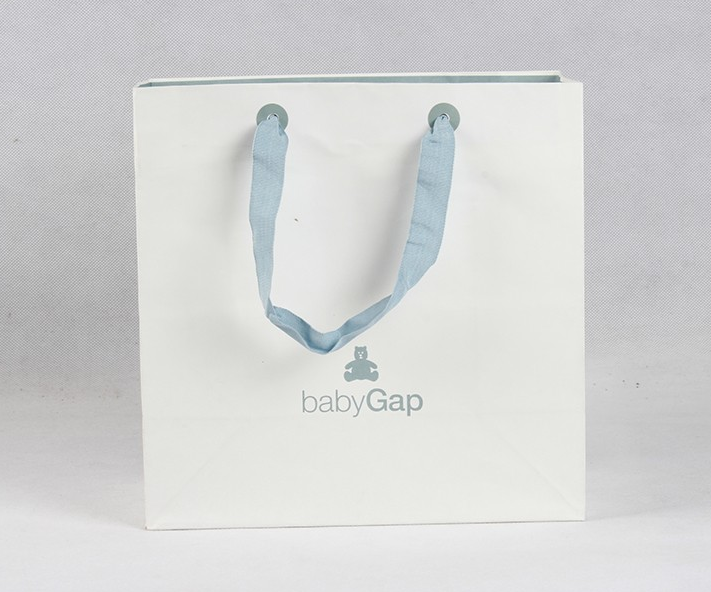 那些年,手提紙袋廠家用來固定提手的方式 那些年,手提紙袋廠家用來固定提手的方式